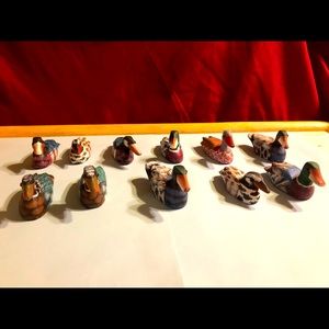Vintage miniature hand painted wooden ducks (numbered) china. 11 pieces